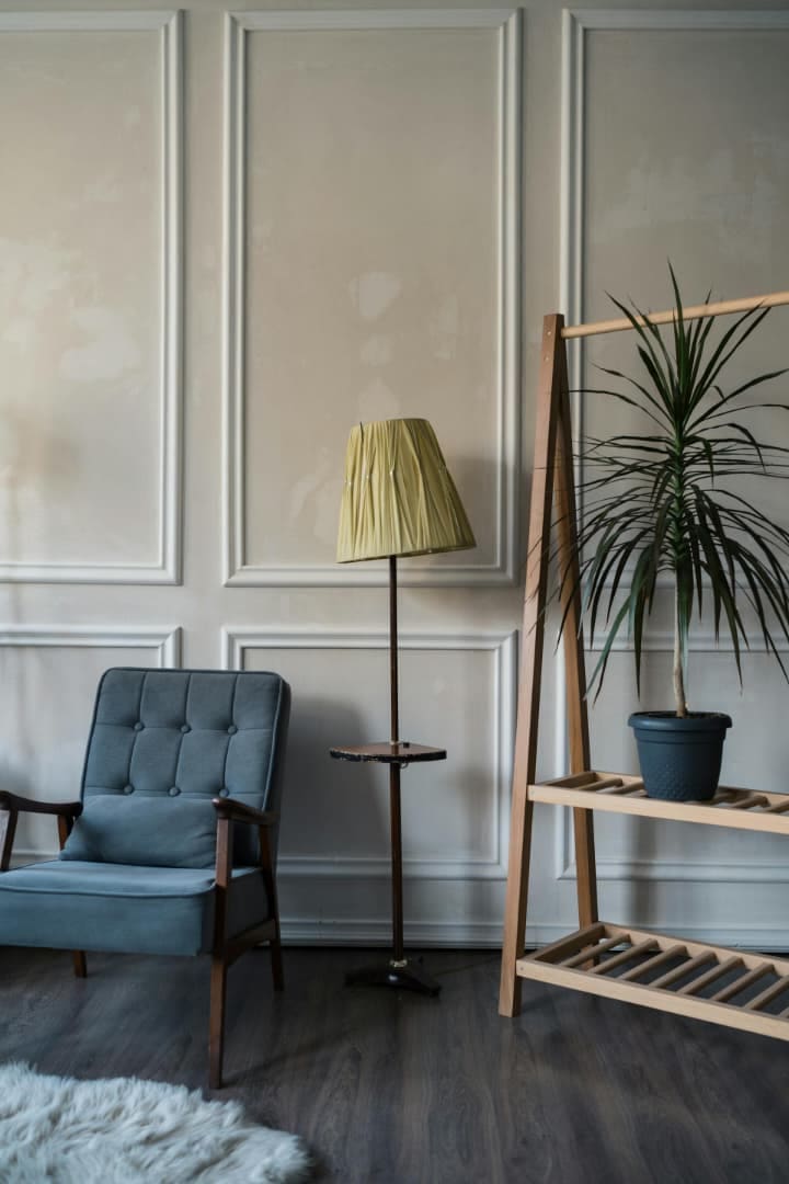 Warm lounge interior with statement lighting and refined client-facing atmosphere.
