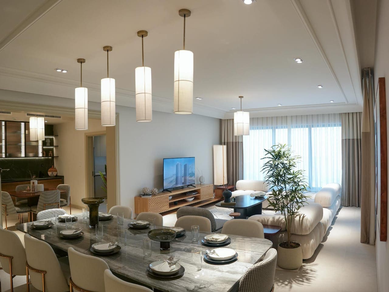 Elegant commercial-style open interior with refined furniture and lighting.